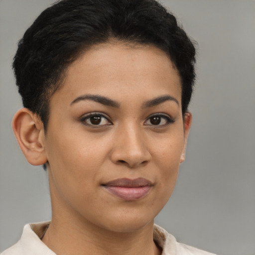 Joyful latino young-adult female with short  brown hair and brown eyes