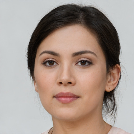 Neutral latino young-adult female with medium  brown hair and brown eyes