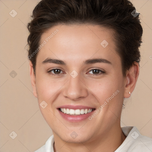 Joyful white young-adult female with short  brown hair and brown eyes