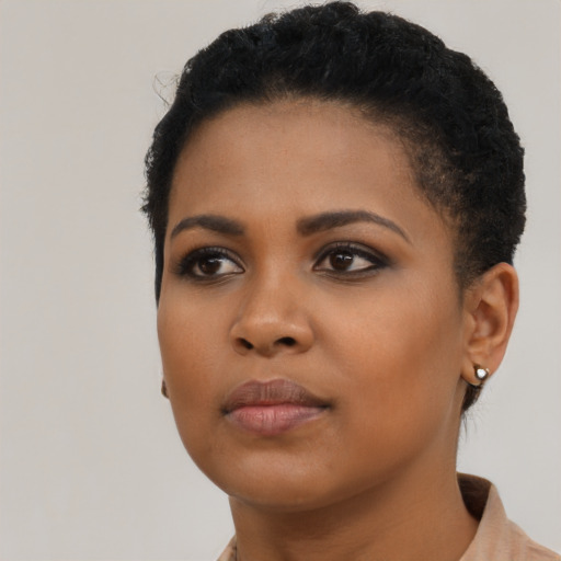 Neutral latino young-adult female with short  black hair and brown eyes