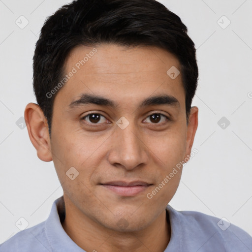 Joyful latino young-adult male with short  brown hair and brown eyes