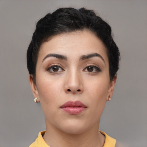 Neutral white young-adult female with short  black hair and brown eyes