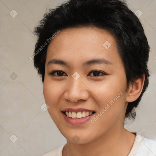 Joyful asian young-adult female with short  black hair and brown eyes