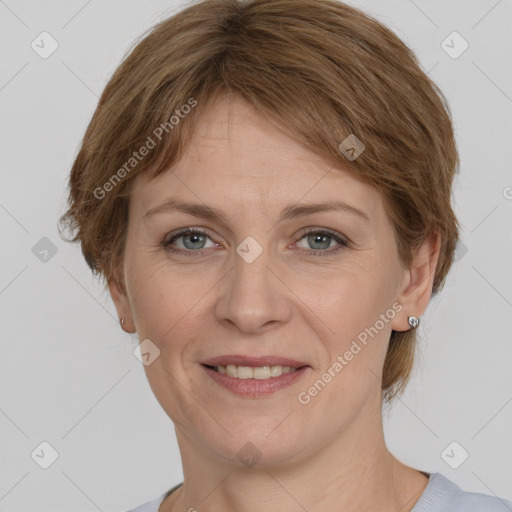 Joyful white adult female with medium  brown hair and grey eyes