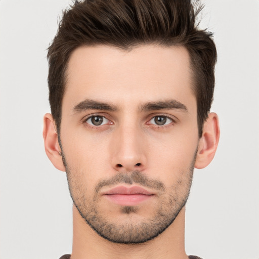 Neutral white young-adult male with short  brown hair and brown eyes