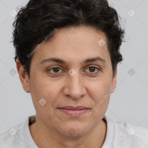 Joyful white adult female with short  brown hair and brown eyes