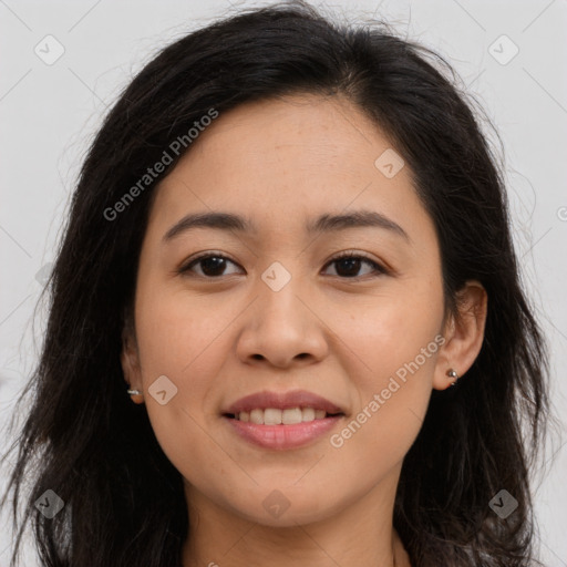 Joyful asian young-adult female with long  brown hair and brown eyes