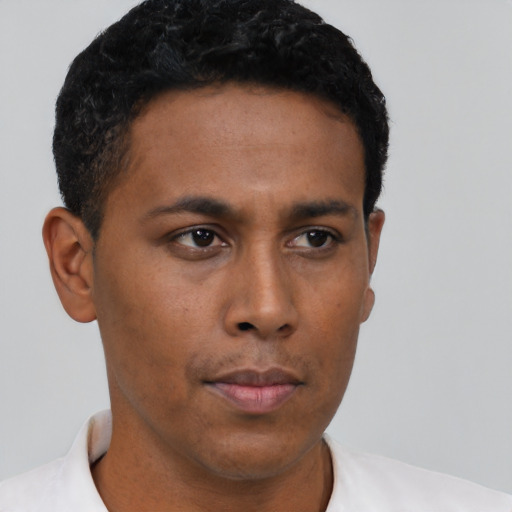 Neutral latino young-adult male with short  brown hair and brown eyes