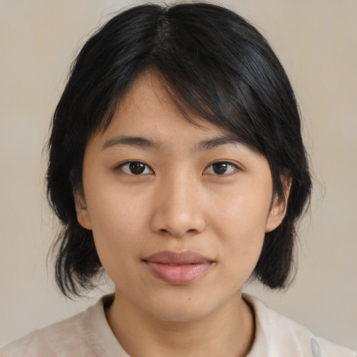 Neutral asian young-adult female with medium  brown hair and brown eyes