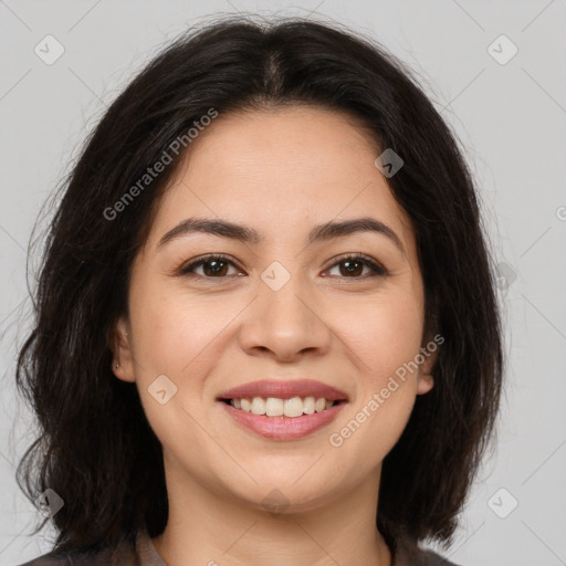 Joyful latino young-adult female with medium  brown hair and brown eyes