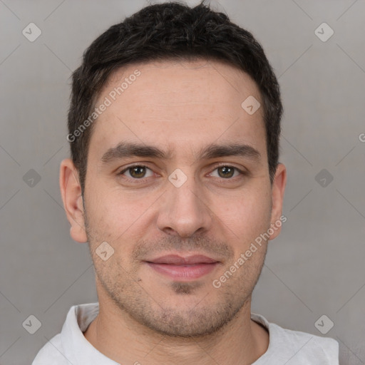 Joyful white young-adult male with short  brown hair and brown eyes