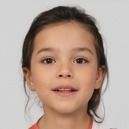 Joyful white child female with medium  brown hair and brown eyes