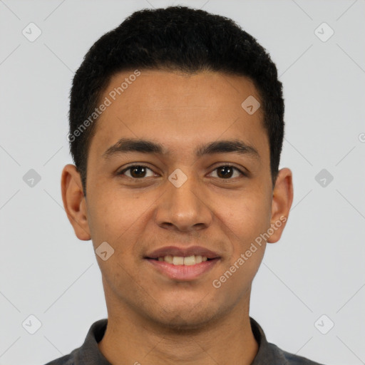 Joyful latino young-adult male with short  brown hair and brown eyes