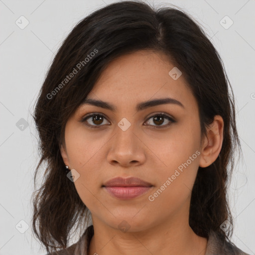 Joyful asian young-adult female with long  brown hair and brown eyes