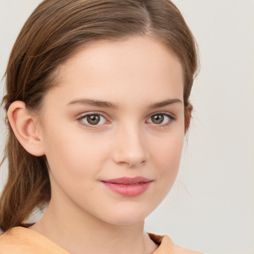 Joyful white child female with medium  brown hair and brown eyes