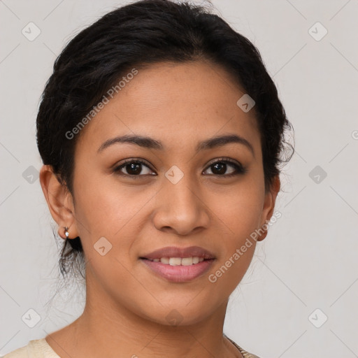 Joyful latino young-adult female with medium  brown hair and brown eyes