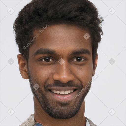 Joyful black young-adult male with short  brown hair and brown eyes