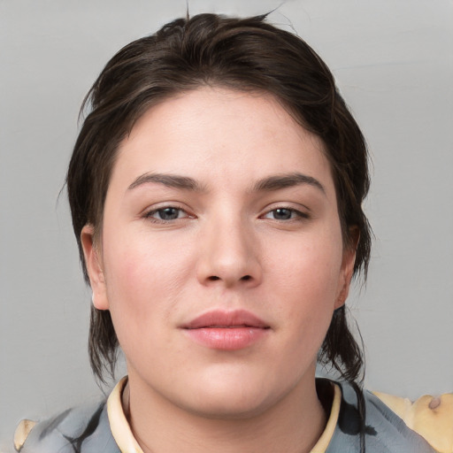 Neutral white young-adult female with medium  brown hair and brown eyes