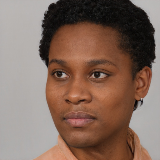 Neutral black young-adult female with short  brown hair and brown eyes