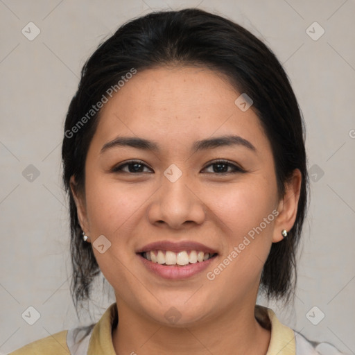 Joyful asian young-adult female with medium  brown hair and brown eyes