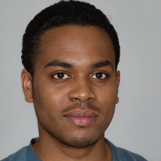 Neutral black young-adult male with short  brown hair and brown eyes
