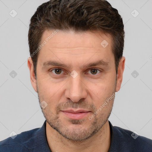 Neutral white adult male with short  brown hair and brown eyes