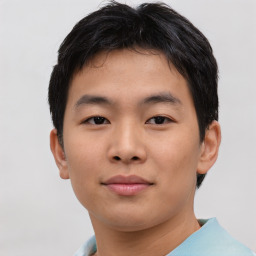 Neutral asian young-adult male with short  brown hair and brown eyes