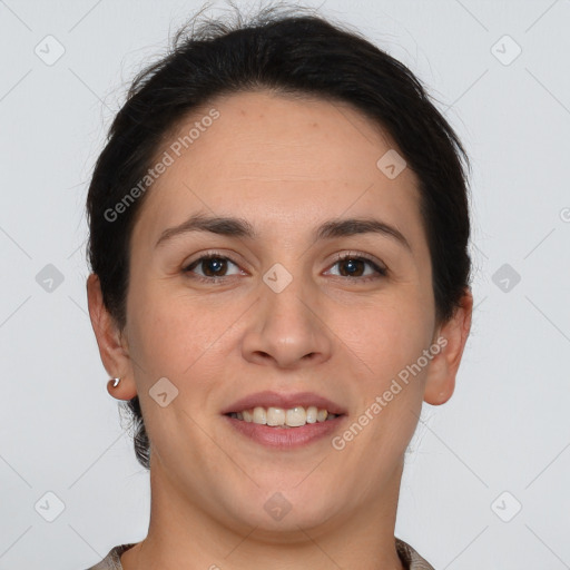 Joyful white young-adult female with short  brown hair and brown eyes