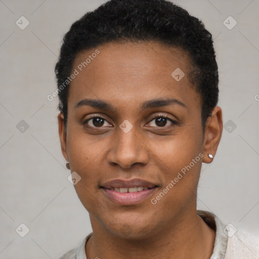 Joyful black young-adult female with short  black hair and brown eyes