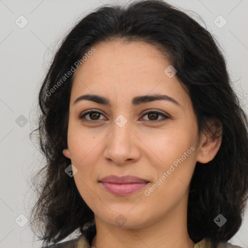 Joyful latino young-adult female with medium  brown hair and brown eyes