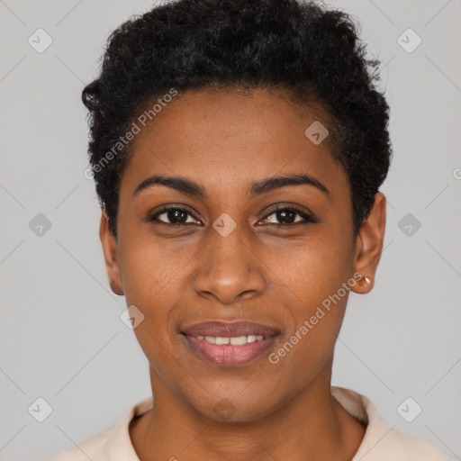 Joyful black young-adult female with short  black hair and brown eyes