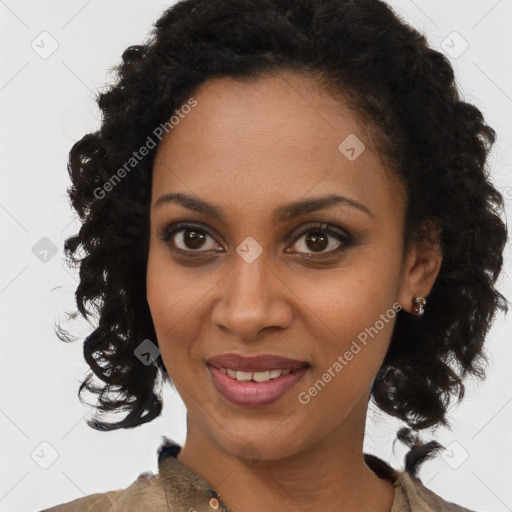 Joyful black young-adult female with long  brown hair and brown eyes