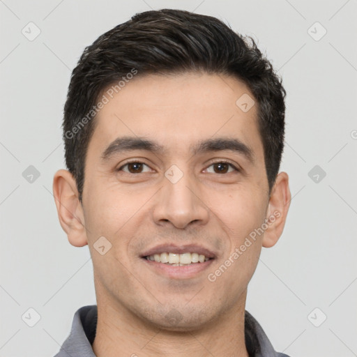 Joyful white young-adult male with short  black hair and brown eyes