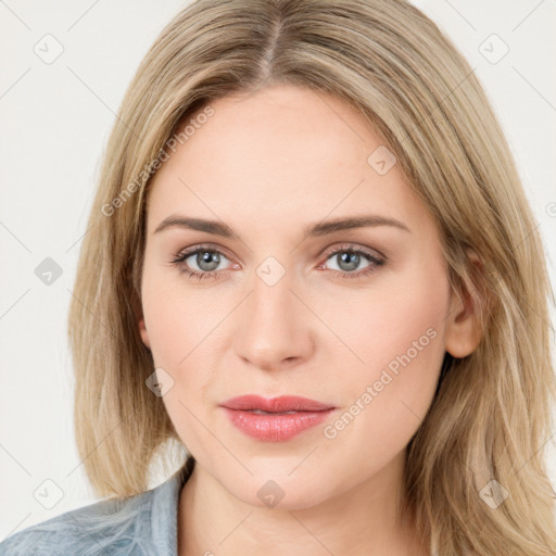 Joyful white young-adult female with medium  brown hair and blue eyes