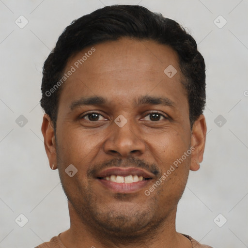 Joyful black young-adult male with short  brown hair and brown eyes