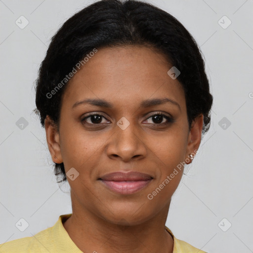Joyful black young-adult female with short  brown hair and brown eyes