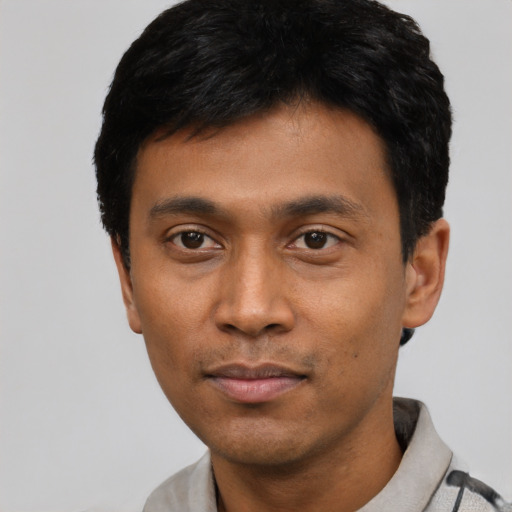 Neutral asian young-adult male with short  black hair and brown eyes