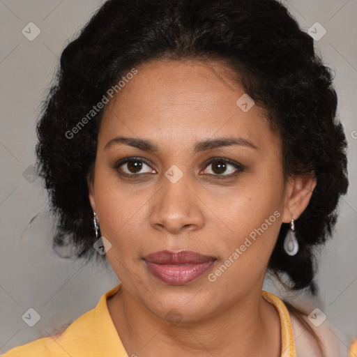 Joyful black young-adult female with medium  brown hair and brown eyes