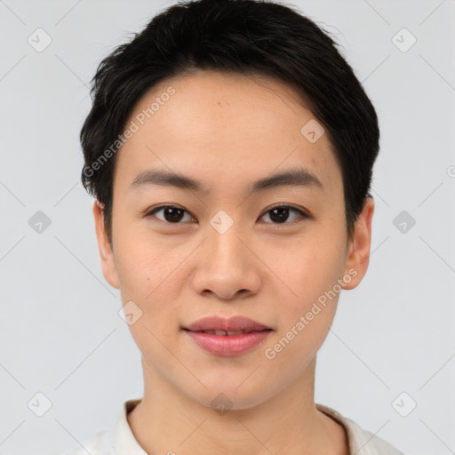 Joyful asian young-adult female with short  brown hair and brown eyes