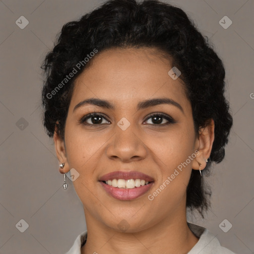 Joyful latino young-adult female with short  black hair and brown eyes