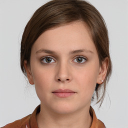 Neutral white young-adult female with medium  brown hair and grey eyes