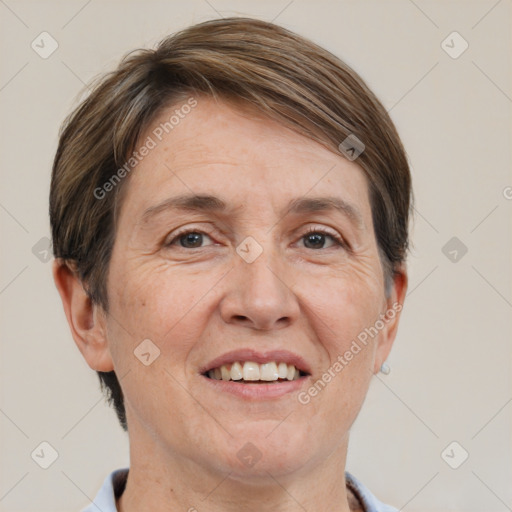 Joyful white adult female with short  brown hair and brown eyes