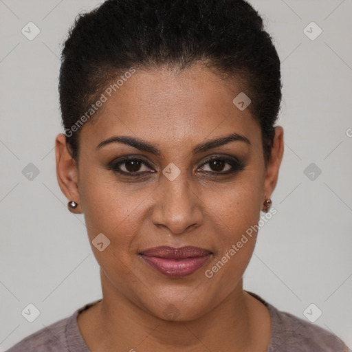 Joyful black young-adult female with short  brown hair and brown eyes