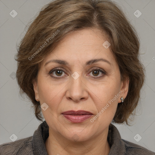 Joyful white adult female with medium  brown hair and brown eyes