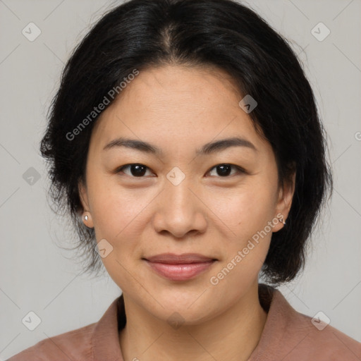 Joyful asian young-adult female with medium  brown hair and brown eyes