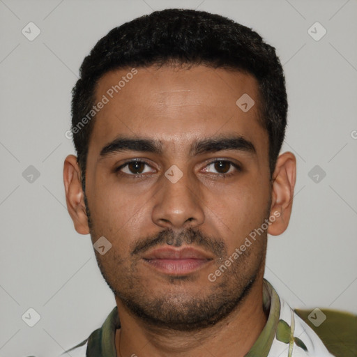 Neutral latino young-adult male with short  black hair and brown eyes