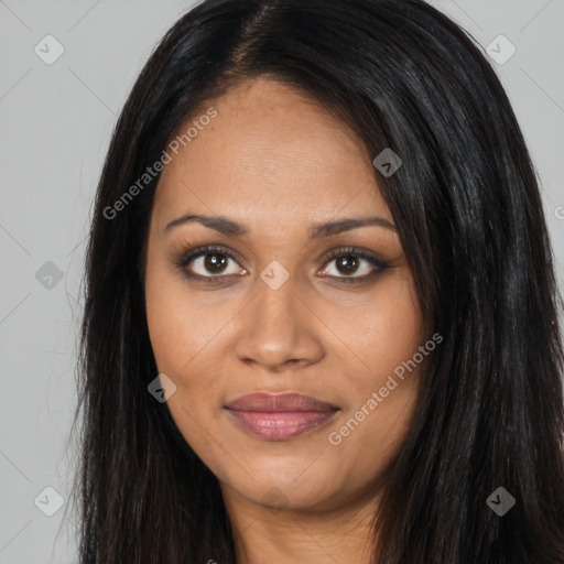 Joyful black young-adult female with long  black hair and brown eyes