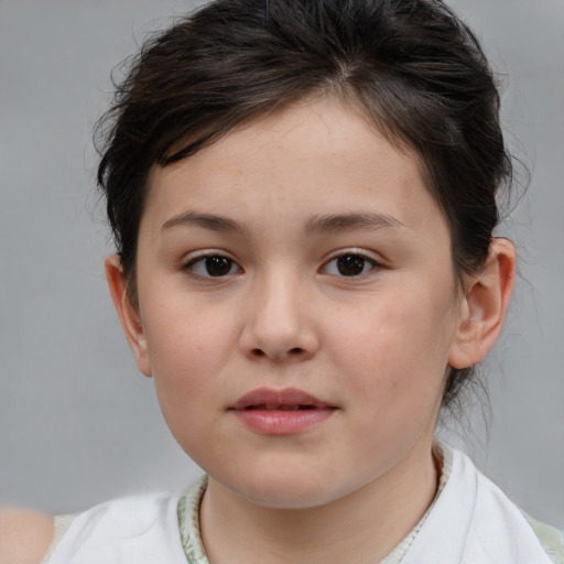 Joyful white child female with medium  brown hair and brown eyes