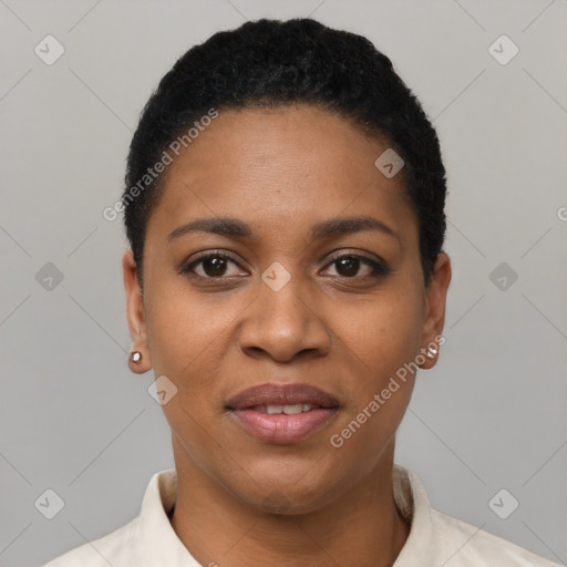 Joyful black young-adult female with short  black hair and brown eyes