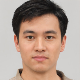 Neutral asian young-adult male with short  brown hair and brown eyes